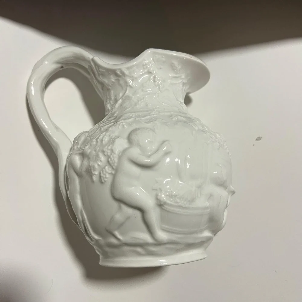 Vintage White Glass Cherub Pitcher Embossed Grape Vine Relief molded Victorian‎
